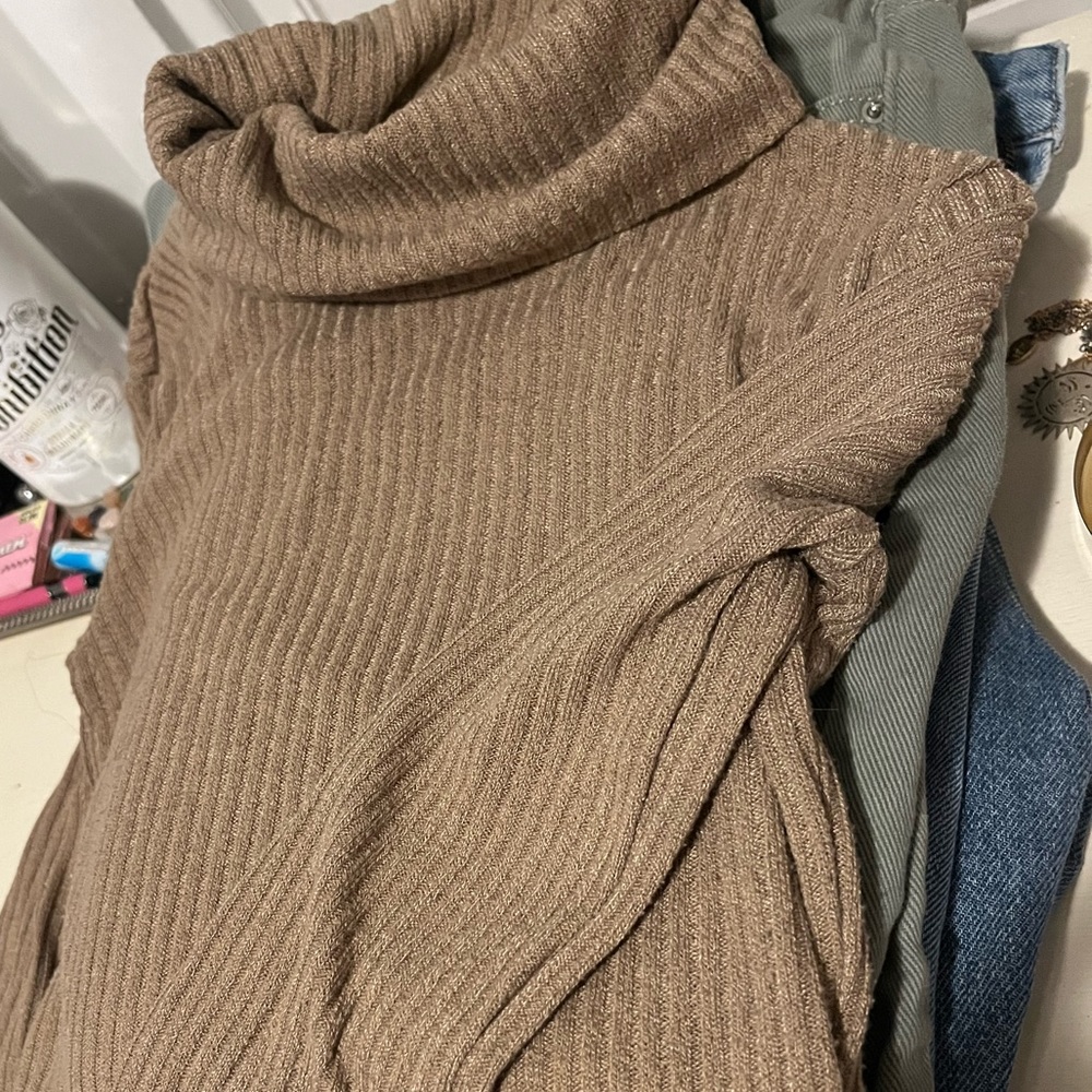 Brown turtle neck shirt